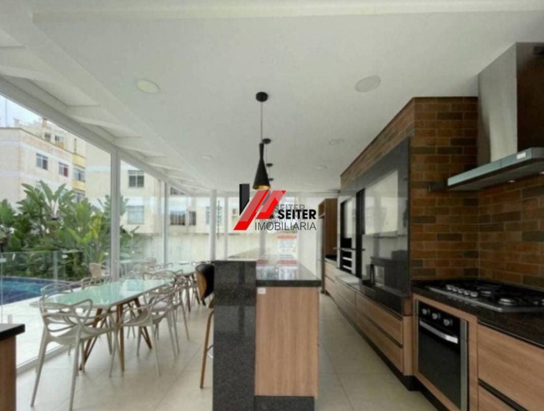 Apartamento mobiliado de 4 dormitorios sendo 2 suites com 3 vagas de garagem a venda Itacorubi