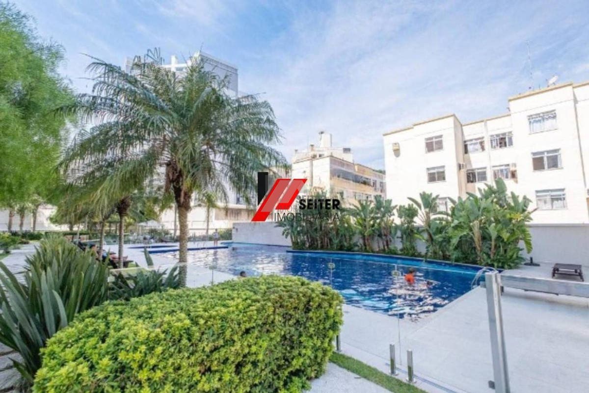 Apartamento mobiliado de 4 dormitorios sendo 2 suites com 3 vagas de garagem a venda Itacorubi
