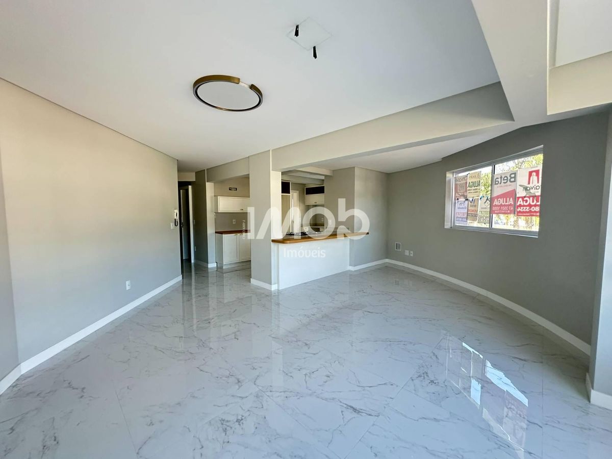 Apartamento com 3 suítes, centro