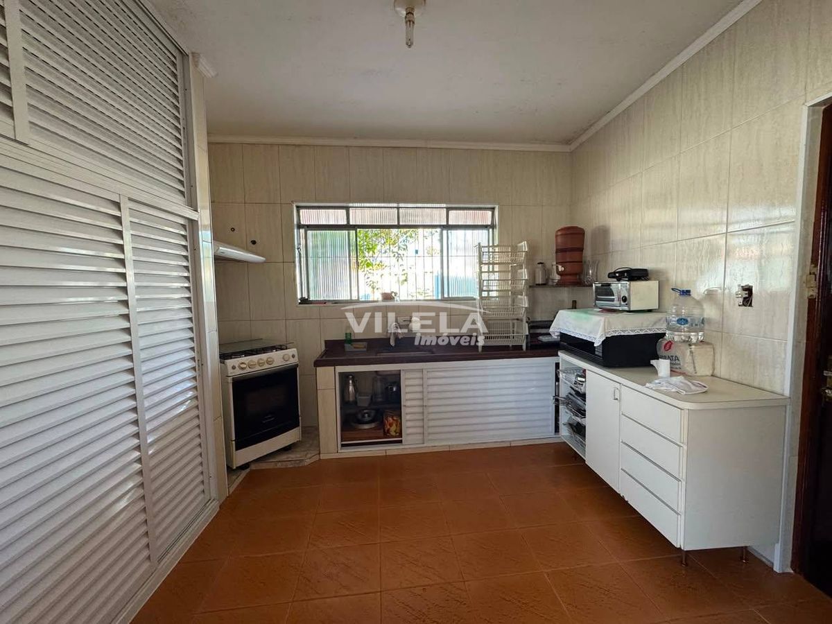 Casa térrea de esquina-jardim aruan-caraguatatuba-sp