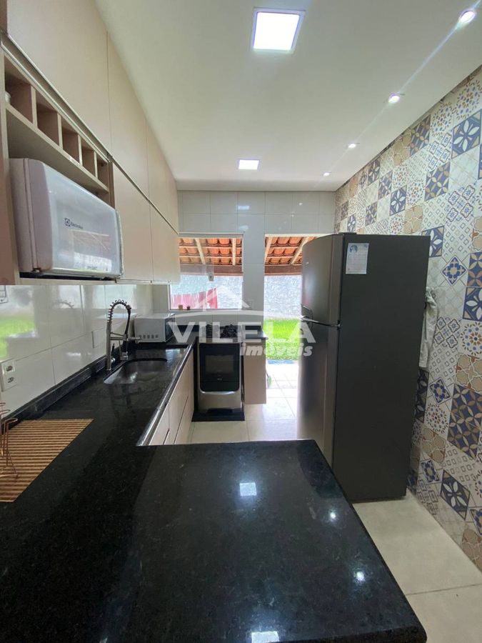 Casa com terreno grande-travessão-caragatatuba-sp