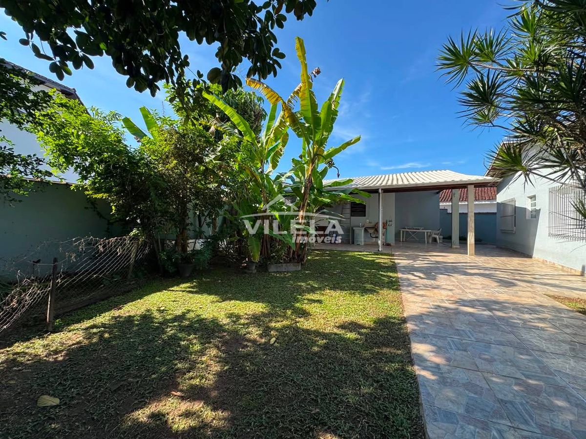 Casa térrea de esquina-jardim aruan-caraguatatuba-sp