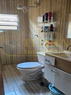 Terreno com 4 casas em Osasco: 355m², 9m frente, desocupado - 12