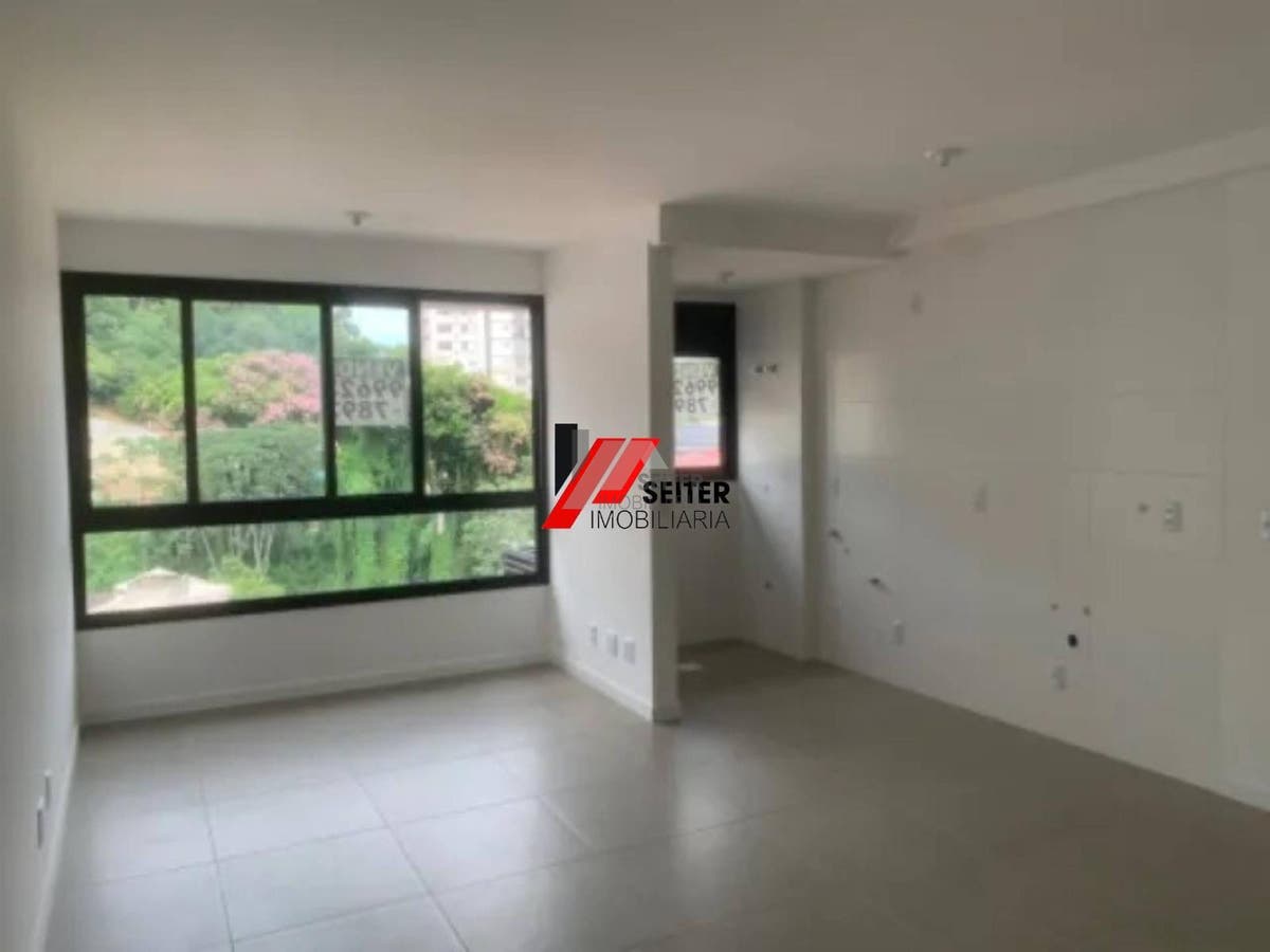 Apartamento de dois dormitórios com suite à venda na Carvoeira em Florianópolis