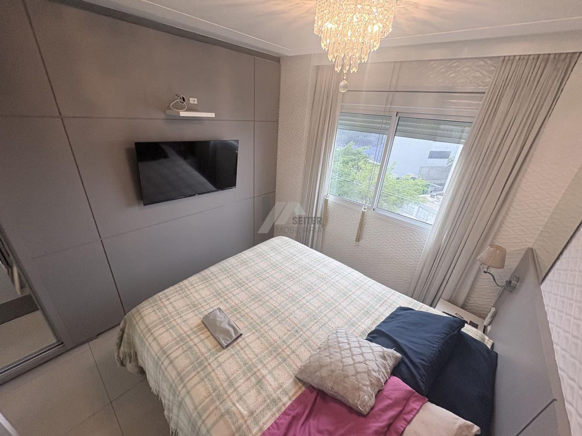 Apartamento de 3 dormitorios com suite a venda no bairro Itacurubi