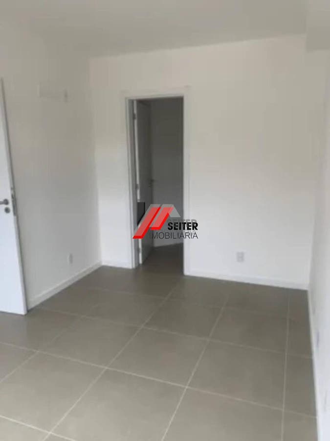 Apartamento de dois dormitórios com suite à venda na Carvoeira em Florianópolis
