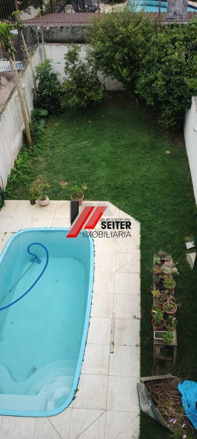 Casa a venda com 4 quartos sendo 4 suítes, 5 banheiros e 5 vagas de garagem, com area total de 279m²