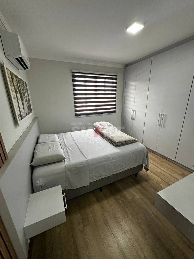 Apartamento semi-mobiliado com 1 suíte + 1 quarto com elevador