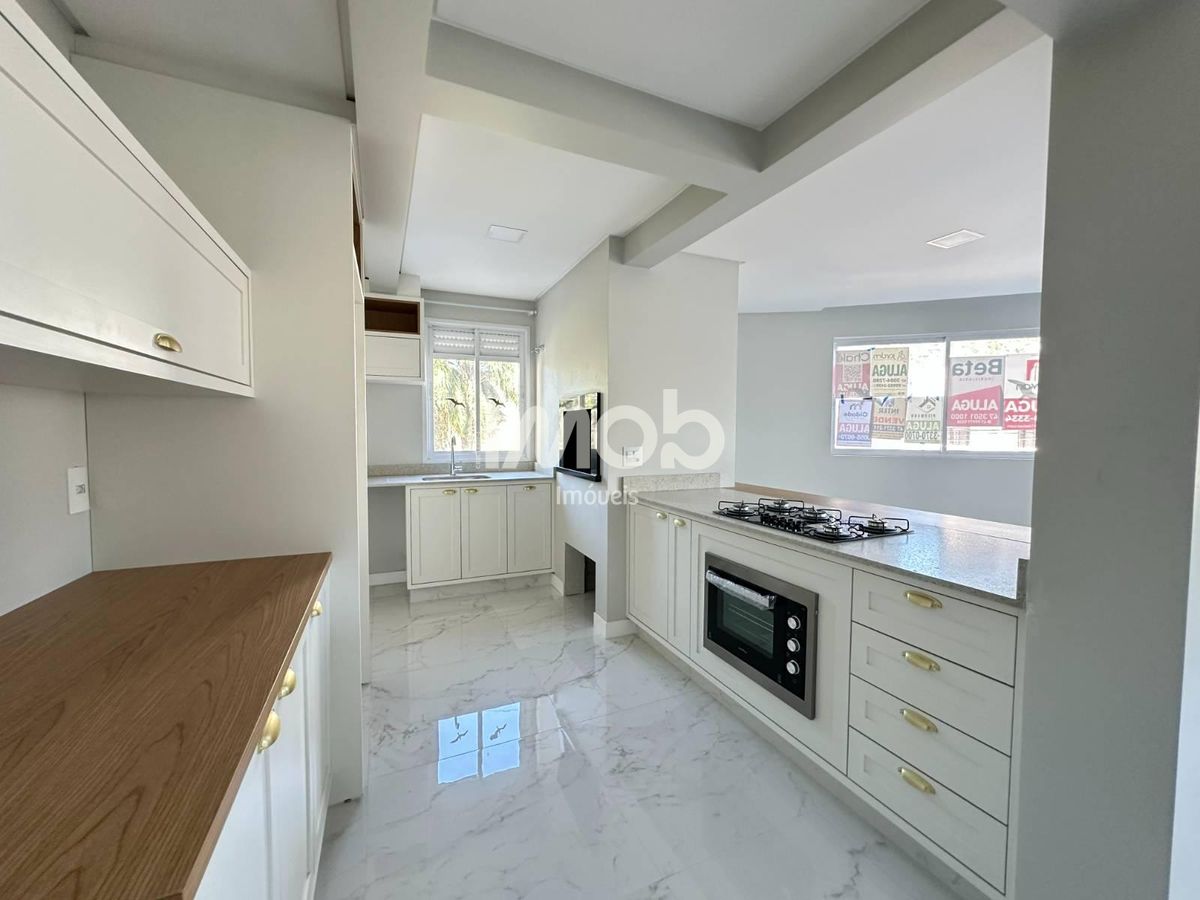 Apartamento com 3 suítes, centro