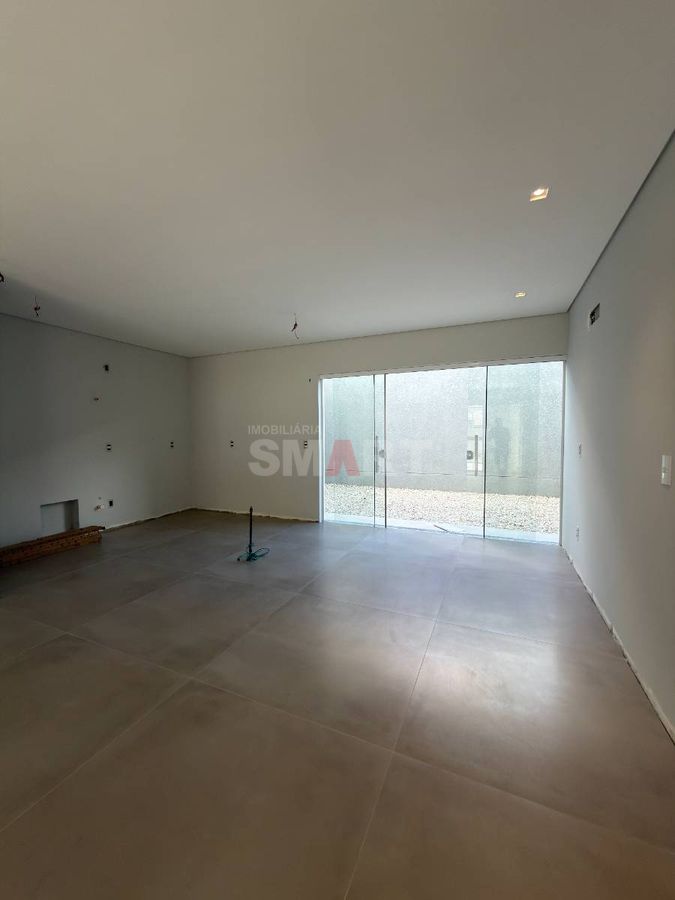 Geminado com 1 suíte + 2 quartos e 2 vagas de garagem coberta em região nobre
