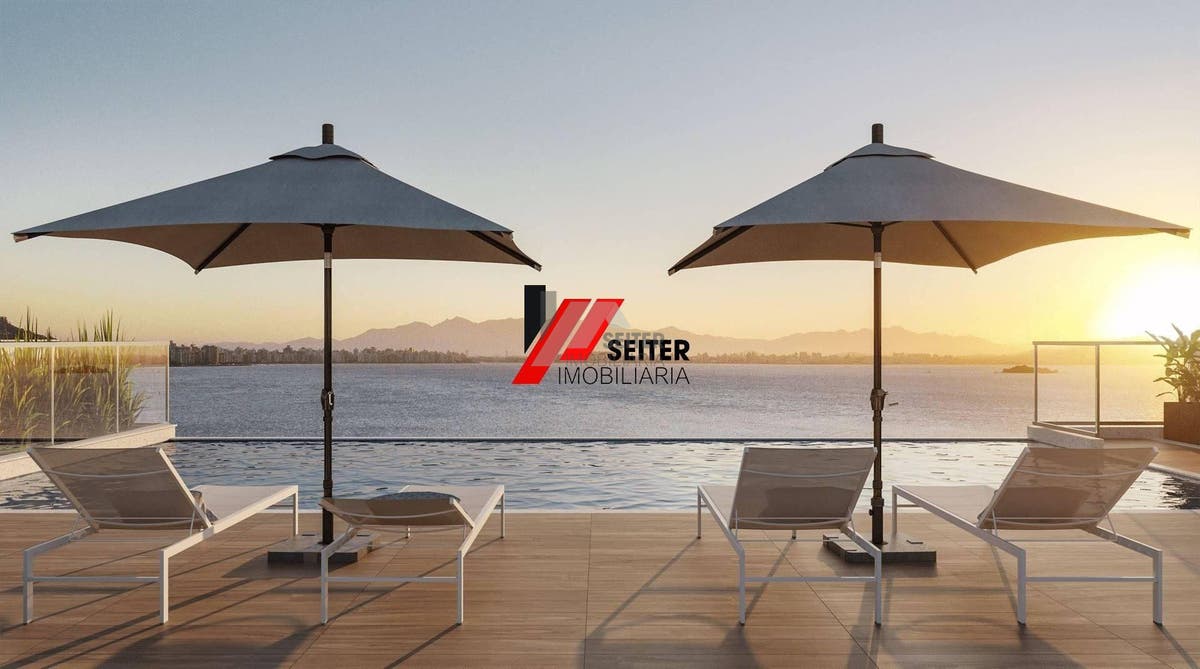 Apartamento 3 dormitórios frente mar cacupé em Florianópolis