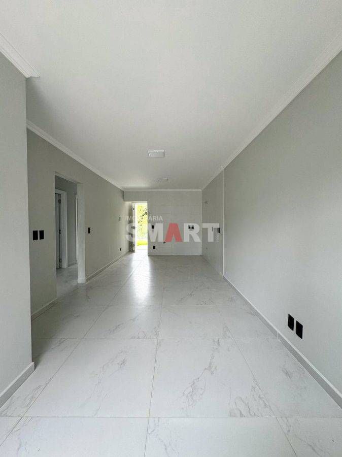 Casa Geminada com 1 Suíte + 2 Quartos e Amplo Espaço de Fundos
