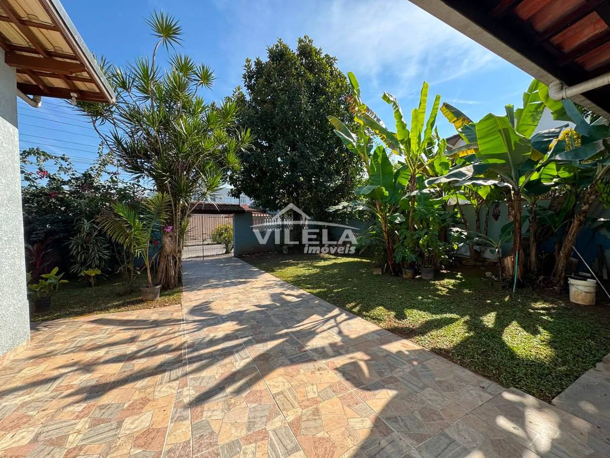 Casa térrea de esquina-jardim aruan-caraguatatuba-sp