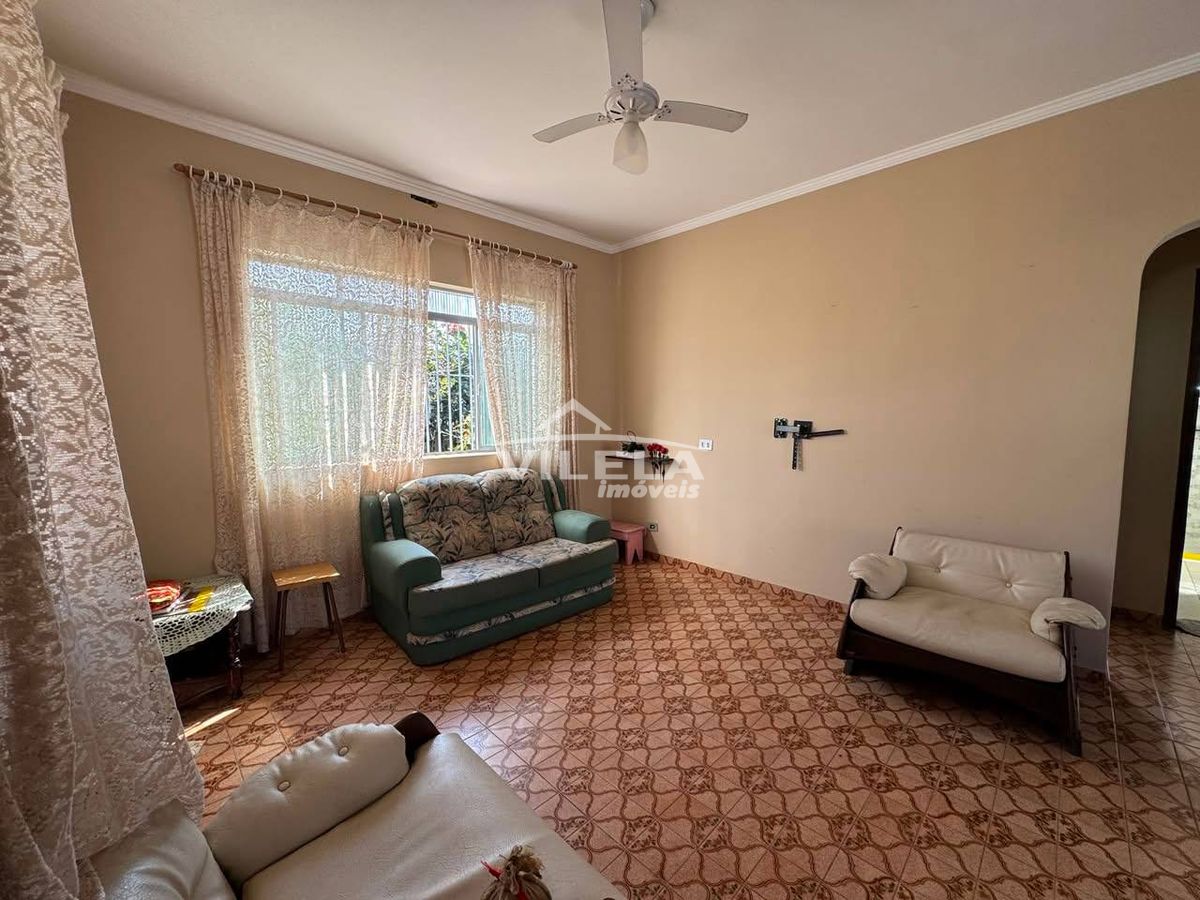 Casa térrea de esquina-jardim aruan-caraguatatuba-sp
