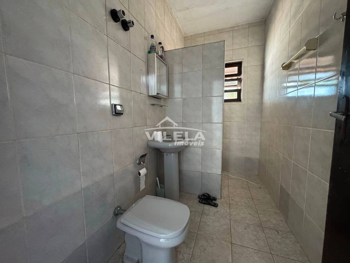 Casa térrea de esquina-jardim aruan-caraguatatuba-sp