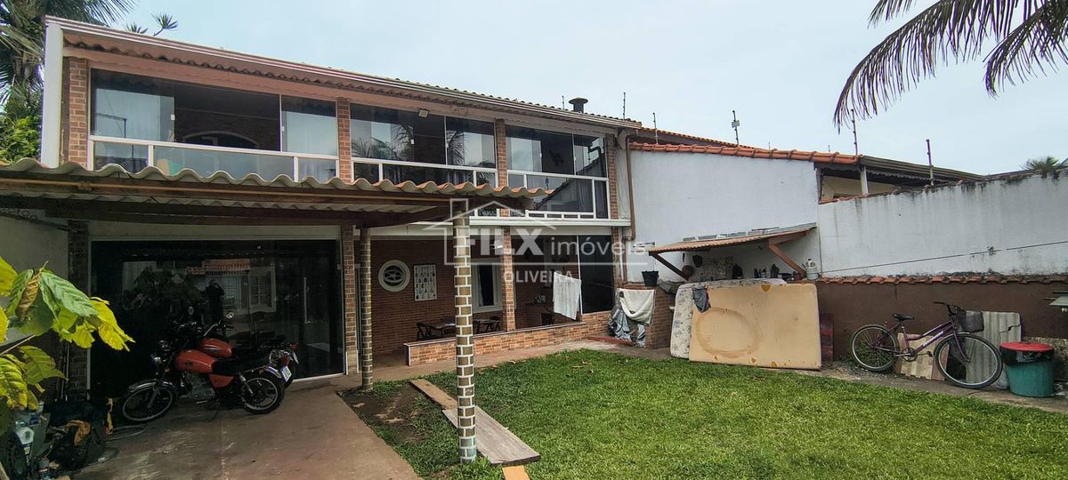 fachada residencial tijolos e vidro