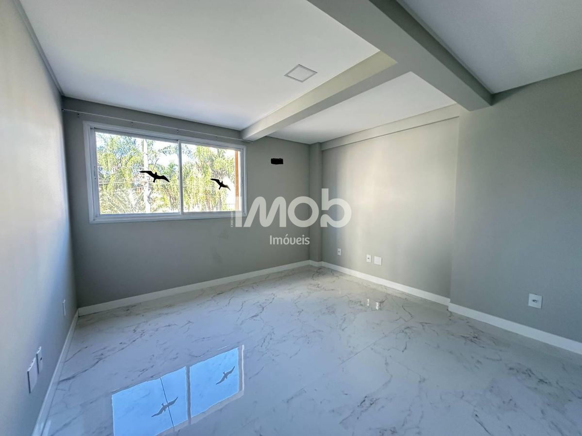 Apartamento com 3 suítes, centro