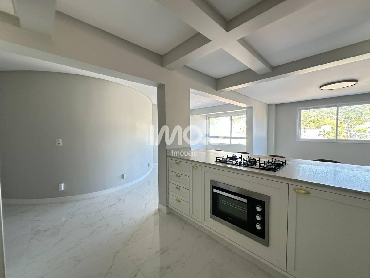 Apartamento com 3 suítes, centro