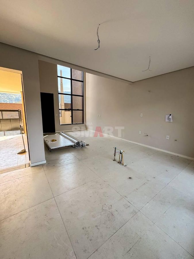 Casa Geminada com 01 Suíte e 02 Quartos no bairro Vila Lalau