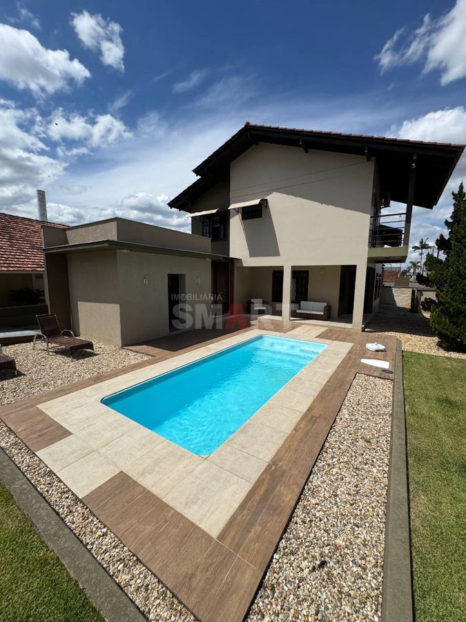 Terreno com 924,27m² com 2 Casas e Piscina no Bairro Vila Lenzi (Avalia Permuta)