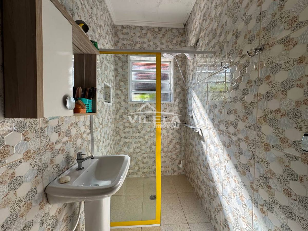 Casa térrea de esquina-jardim aruan-caraguatatuba-sp