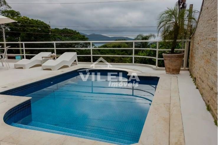 Sobrado 3 andares com vista para o mar condominio roteiro do sol-massaguaçu-caraguatatuba-sp