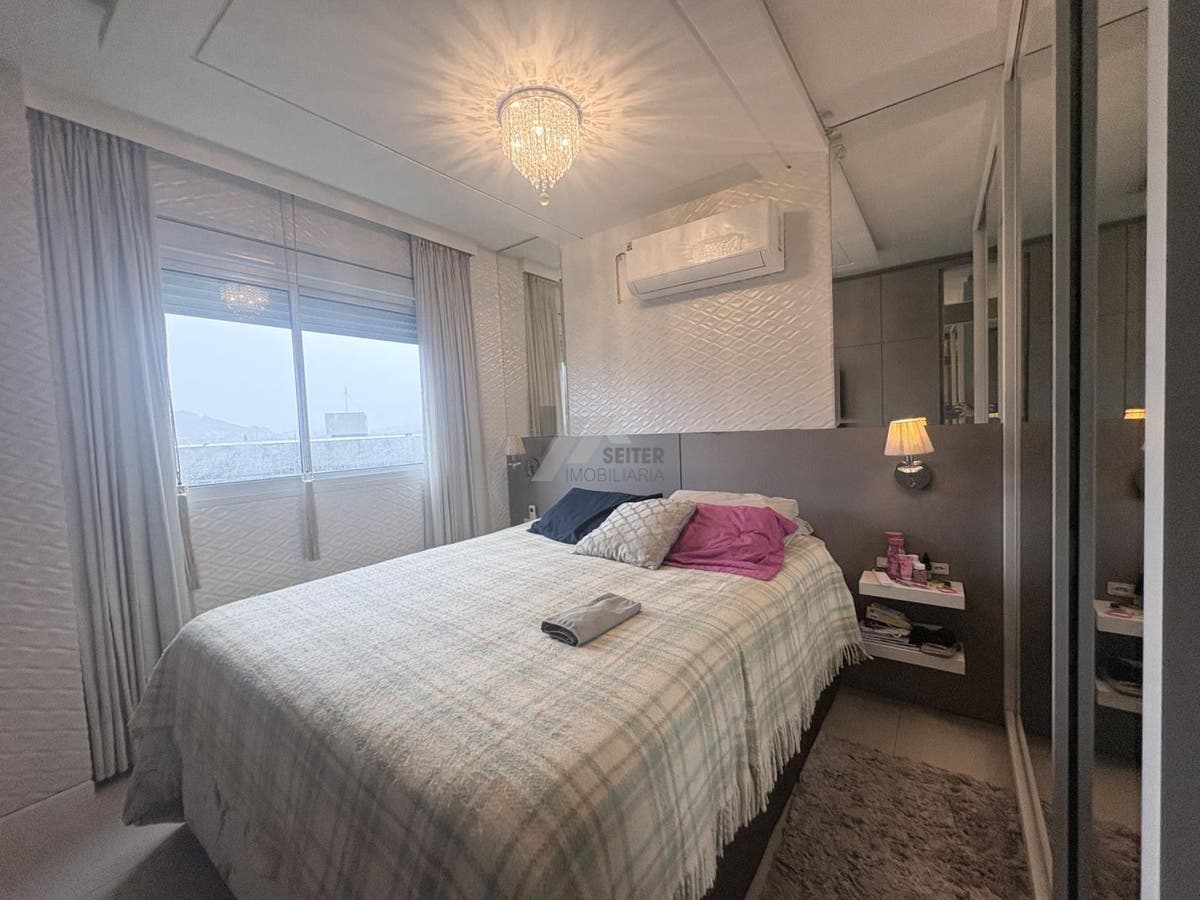 Apartamento de 3 dormitorios com suite a venda no bairro Itacurubi