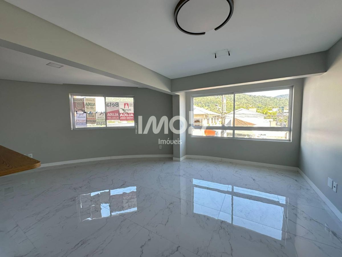 Apartamento com 3 suítes, centro