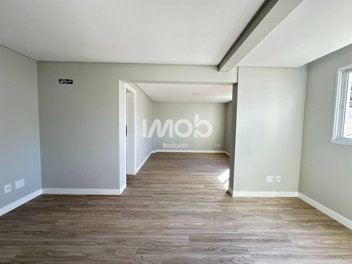 Apartamento com 3 suítes, centro