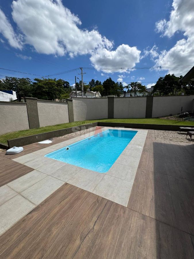 Terreno com 924,27m² com 2 Casas e Piscina no Bairro Vila Lenzi (Avalia Permuta)