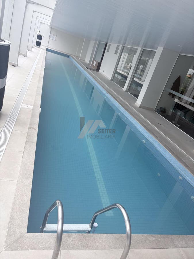 Apartamento mobiliado de 4 dormitorios sendo 2 suites com 3 vagas de garagem a venda Itacorubi