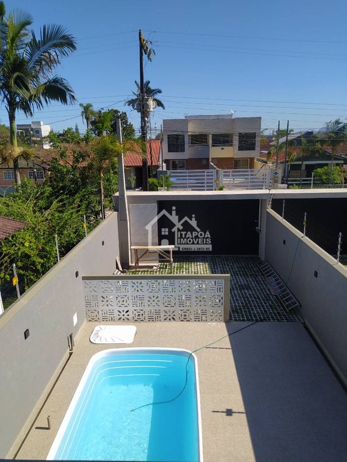 Sobrado com 4 quartos, 1 suíte, mobiliado, Balneário Sai Mirim, a 400m do mar.