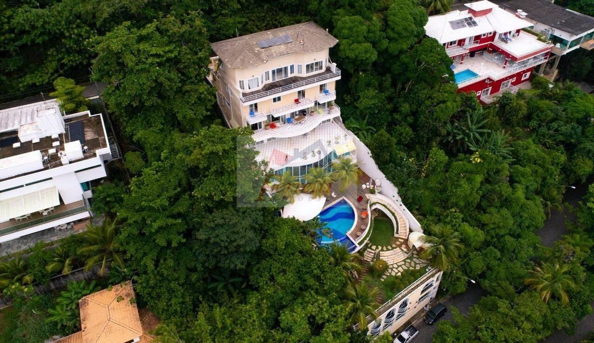 Casa Alto Padrão com 11 suítes á venda no condomínio Península - Guarujá/SP