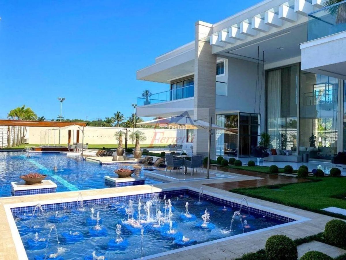 Mansão finamente decorada e climatizada  com 9 suítes  à venda no bairro Jardim Acapulco - Guarujá/SP