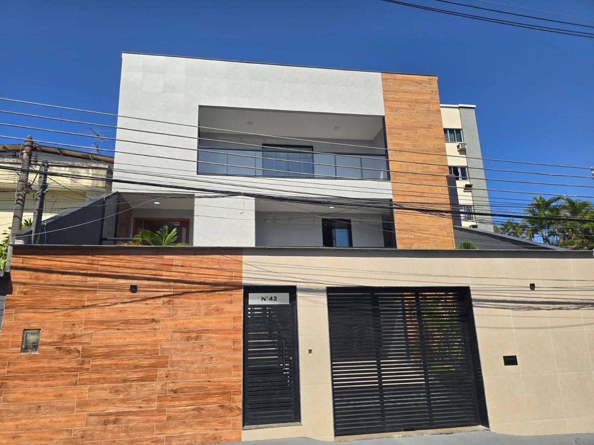 Casa 3 suítes em Jardim Guanabara, Rio de Janeiro: design moderno com piscina e área gourmet