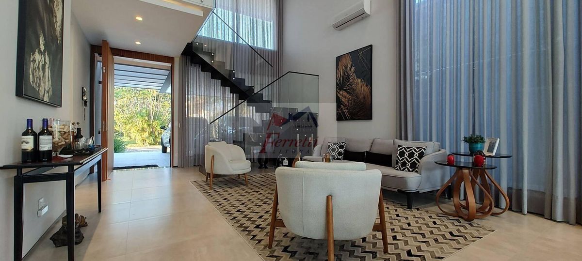 Casa de Alto Padrão com 4 suítes decorada e climatizada em Jardim Acapulco - Guarujá/SP