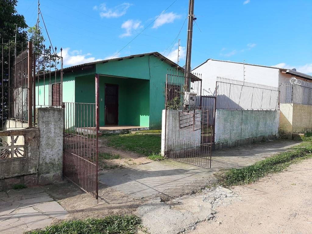 Casa escriturada à venda de alvenaria c/ 02 dormitórios situada na Rua Chile, 735 no valor de R$ 220.000,00 ( aceita carro atéo valor R$ 60.000,00 ) no bairro Jardim Universitário - Casa em Santa Isabel, Viamão - à venda - imobiliária TN SILVA