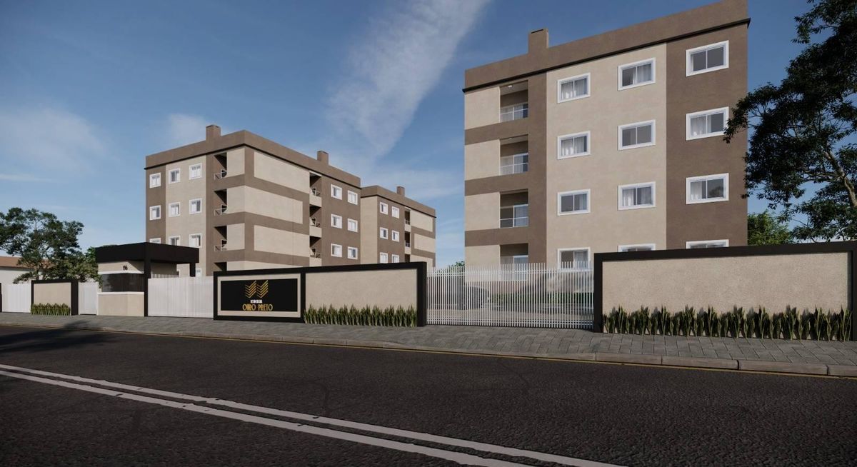 Prédio residencial com duas edificações e muro de entrada na rua