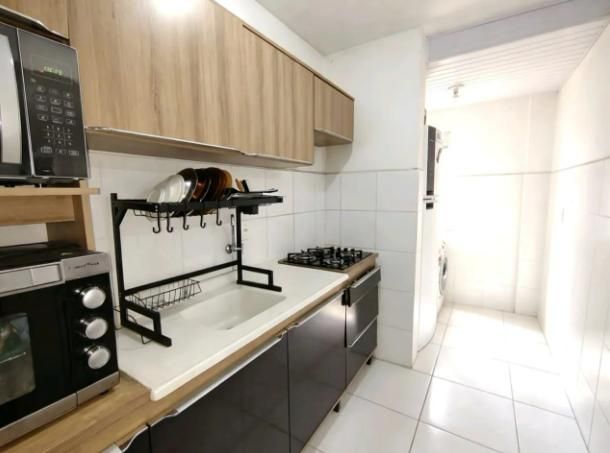 Apartamento a venda com 2 dormitórios com sacada e churrasqueira, 58m², no Balneário do Estreito