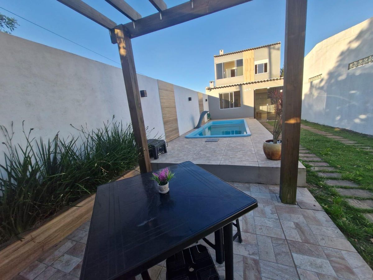 Casa com piscina para temporada para conforto e bons momentos - Casa em Cassino, Rio Grande - para temporada - SANDRA ALUGA E VENDE IMÓVEIS NO CASSINO