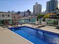 Apartamento a venda 2 dormitórios (1 suíte), sacada com churrasqueira e vista para a beira mar continental no Estreito - Apartamento em Estreito, Florianópolis - à venda - Conceito Imóveis