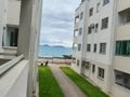 Apartamento a venda com 2 dormitórios com sacada e churrasqueira, 58m², no Balneário do Estreito