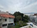 Apartamento com Vista para o Mar e bem próximo ao Parque de Coqueiro | 2 Dormitórios, Sol da Manhã e 1 Vaga - Coqueiros, Florianópolis/SC - Apartamento em Coqueiros, Florianópolis - para locação - Conceito Imóveis