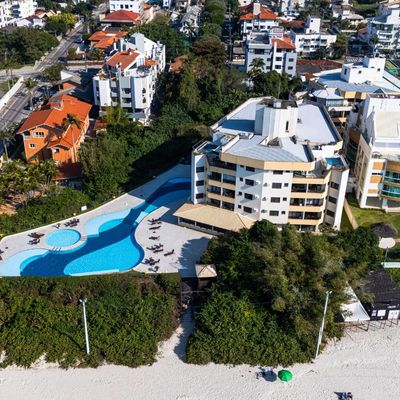 Lindo apartamento de um quarto pé na areia - Apartamento em Canasvieiras, Florianópolis - para temporada - Hoteislab Assessoria e Negócios LTDA