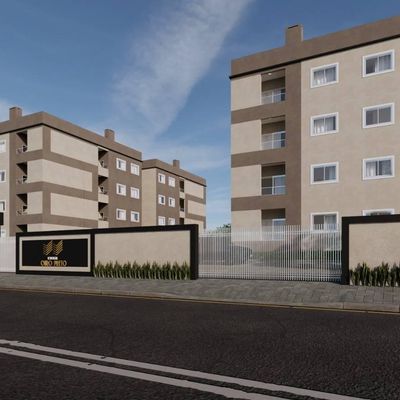 Prédio residencial com duas edificações e muro de entrada na rua